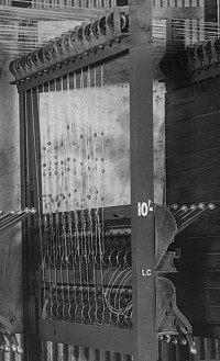 94/222/23-8/18/10 Glass negative, full plate, early chain and pulley driven totalisator pre-assembled in Automatic Totalisators Limited factory, 1913(Click the thumbnail to see the original image)